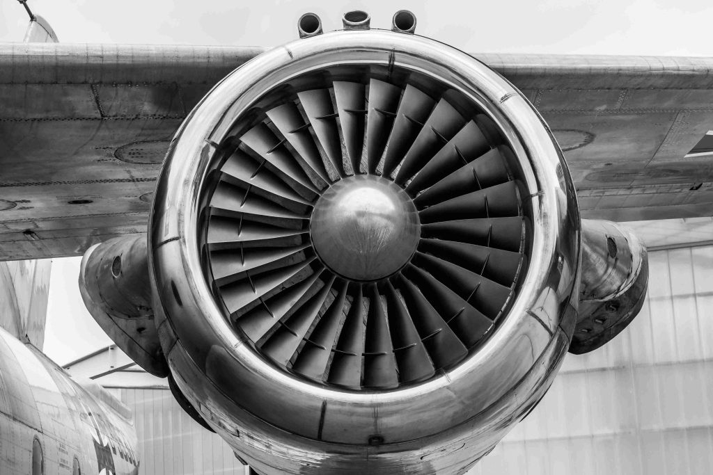 a close-up of an aeroplane engine in black and white