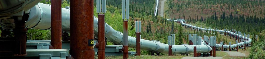oil and gas pipelines spread across nature's landscape