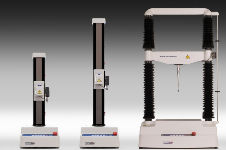 3 different Stable Micro Systems texture analysis and volume measurement instruments next to one another