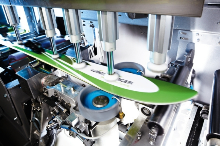 Wintersteiger 's ski and snowboard machine for tuning, gridning, repairs